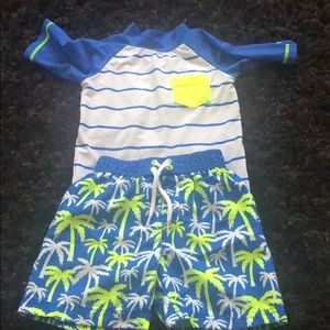 Used boys swim trunk and Rashguard-size 2t